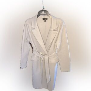 Baby Blue light-weight trench with a high waisted belt.